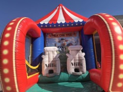 637907507 122186282444796550 4897094873975500881 n 1772160558 Carnival Game - Milk Can Toss