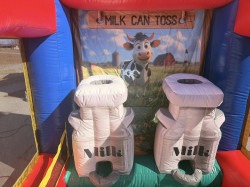 639726635 122186282690796550 8965215345856719562 n 1772160558 Carnival Game - Milk Can Toss
